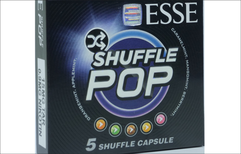 Indonesian cigarette pack showing colorful capsules